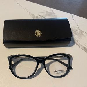 Black and silver authentic glasses.54/15. 140